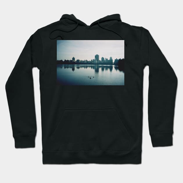 Film photo of Central Park, New York City, with its lake and surrounded buildings Hoodie by karinelizabeth